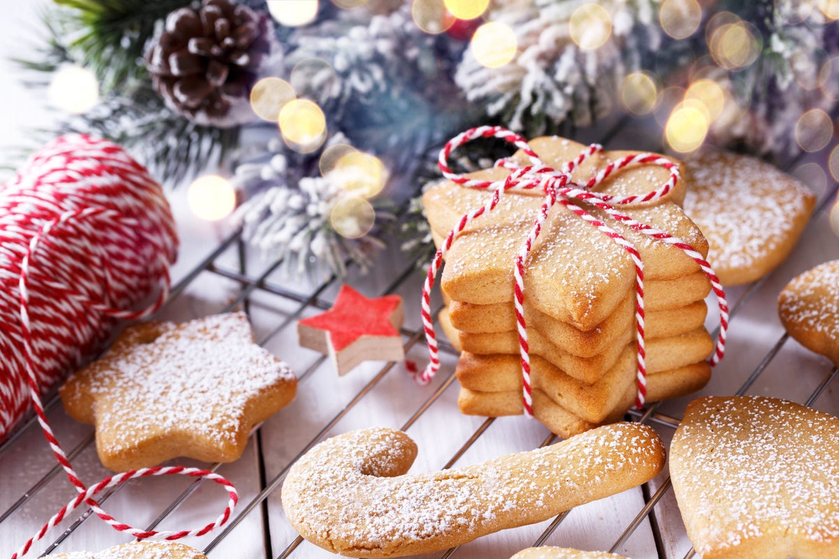 Christmas biscuits tied with red and white string