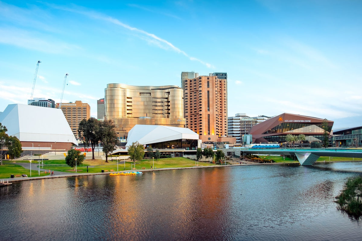 Adelaide city skyline across the River Torrens on a sunny day