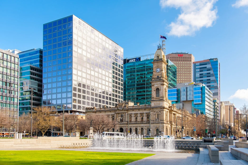 Office towers and a heritage building around Victoria Square in Adelaide