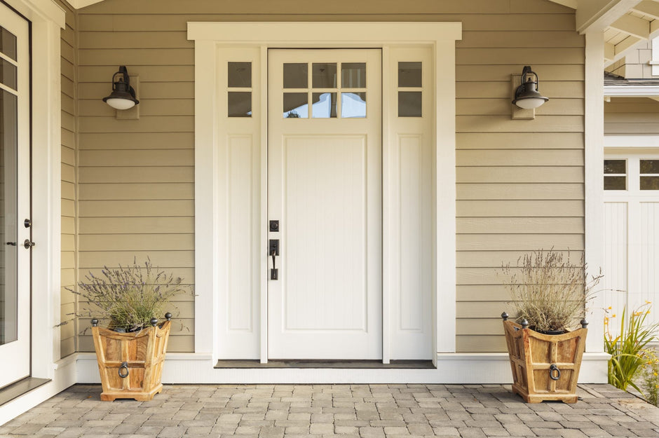 The front door and porch of a newly finished house