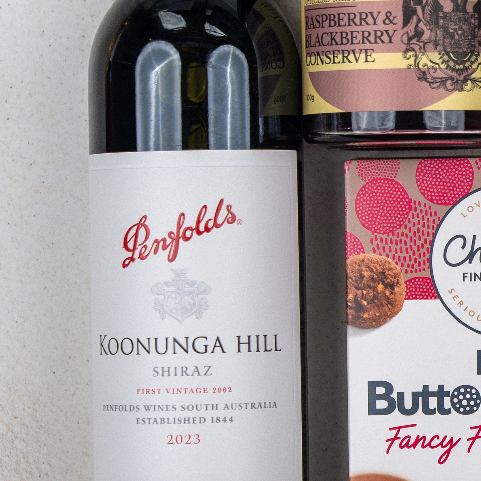 The Hamper Boutique Co's Taste Explorer Gift Hamper is arranged on a light countertop.
