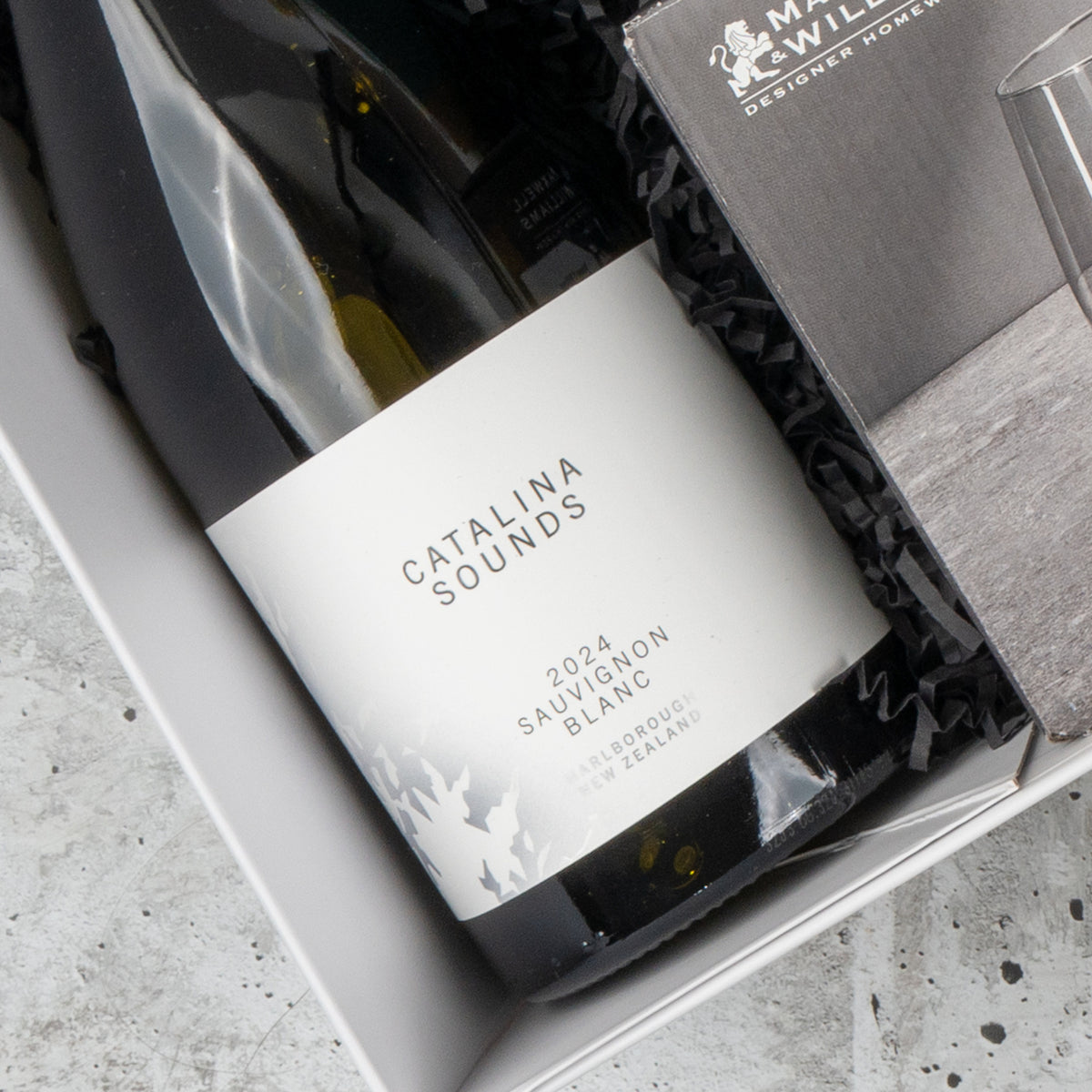 White Wine and Relaxation: Sauvignon Blanc in the gift box with black crinkle paper