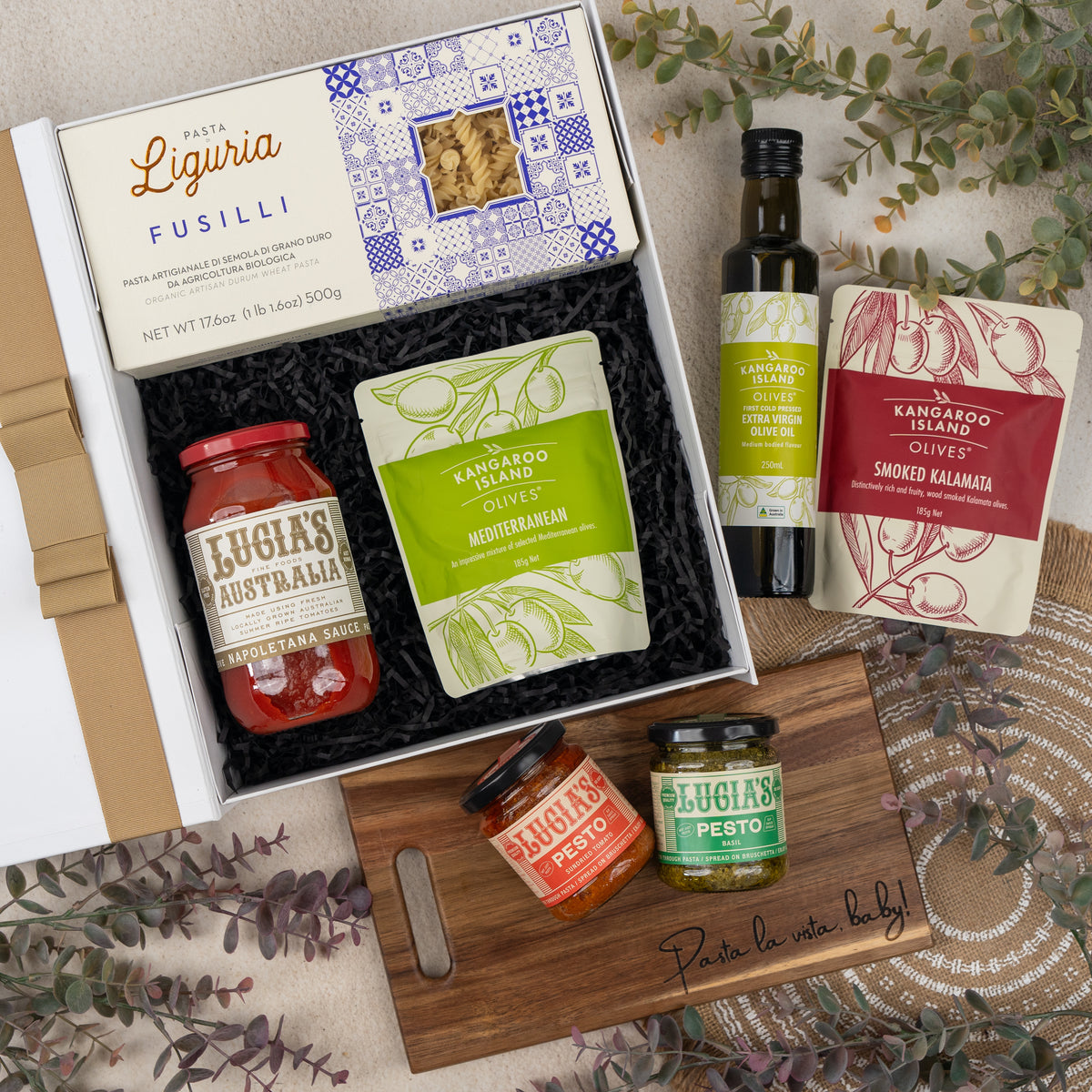 Mediterranean Pantry Hamper: pasta, sauce, olive oil, olives, two pestos and a Pasta la vista board