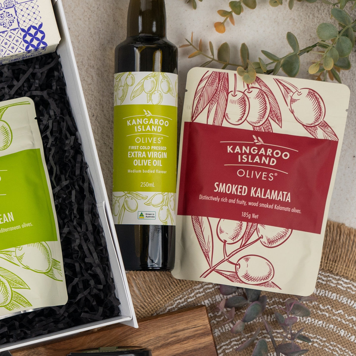 Mediterranean Pantry Hamper: extra virgin olive oil and a pouch of smoked Kalamata olives