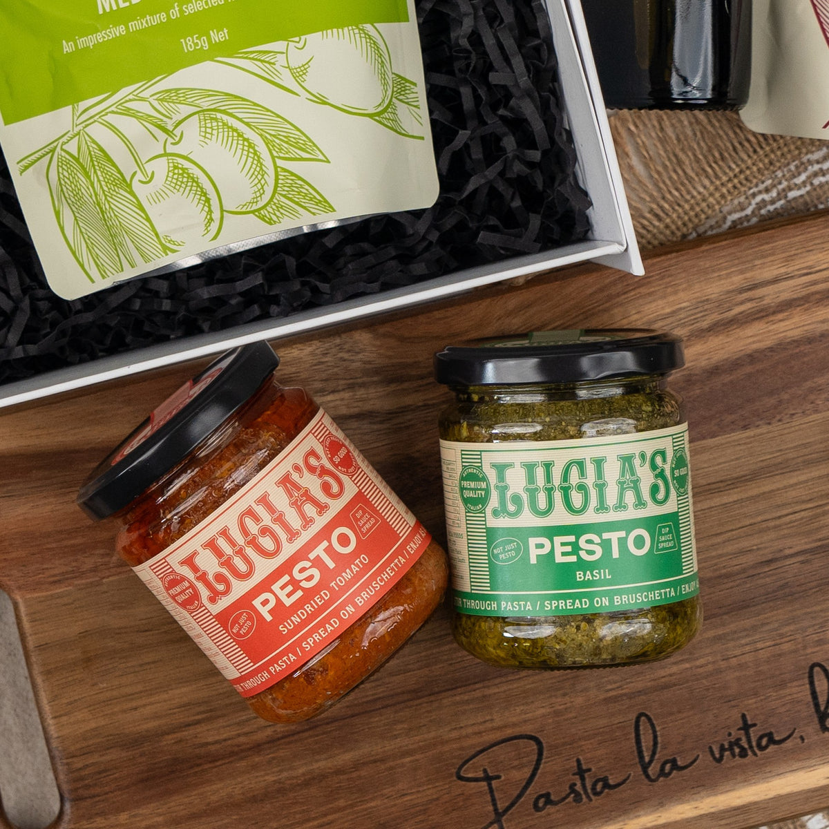 Mediterranean Pantry Hamper: Lucia's sundried tomato and basil pestos on a Pasta la vista board