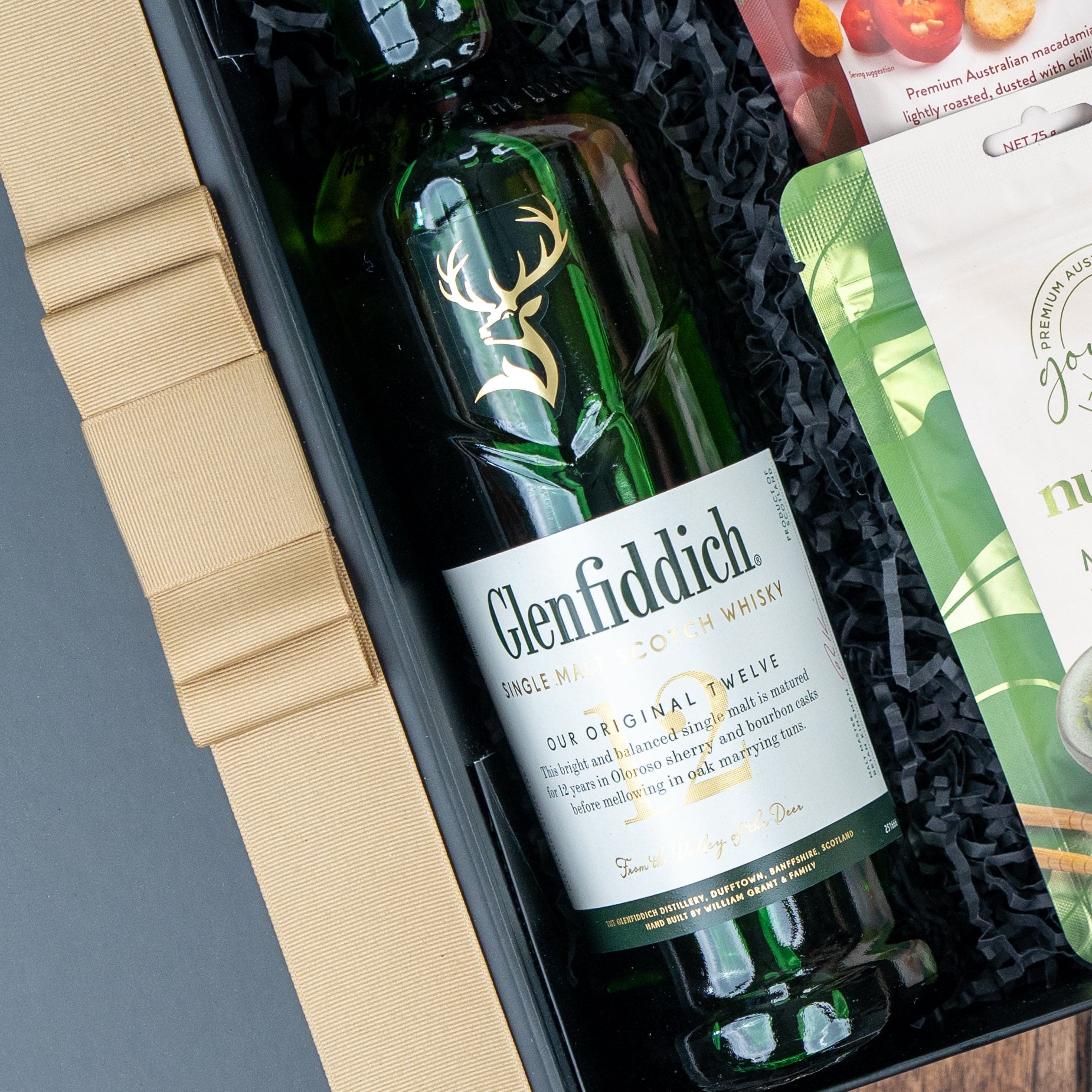 Glenfiddich 12 Year Old Whisky 700ml bottle with rich, fruity notes and a smooth, mellow finish, perfect for whisky enthusiasts.