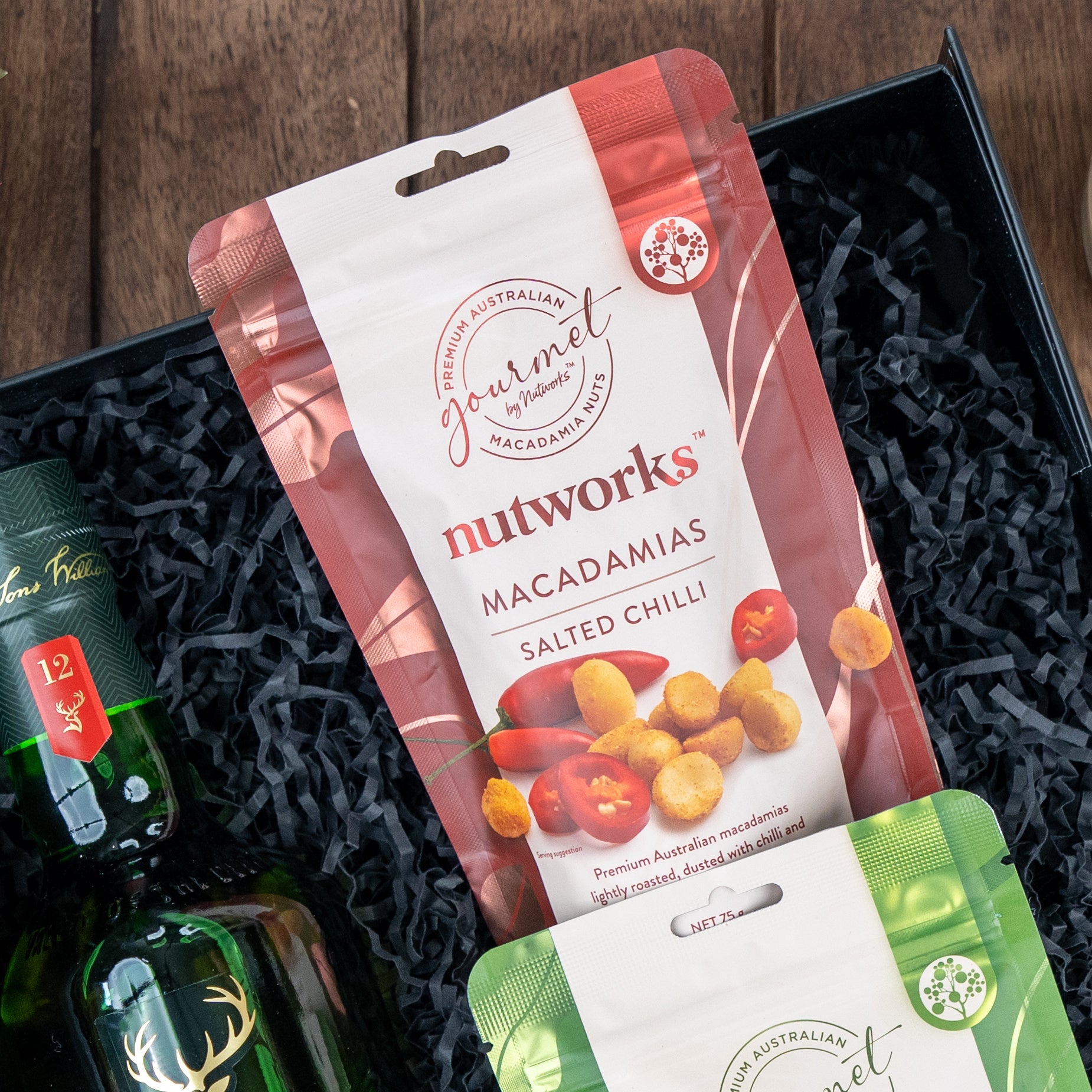 Nutworks Salted Chilli Macadamias 75g - Premium roasted macadamia nuts with a spicy chilli seasoning, perfect for snacking or gifting.
