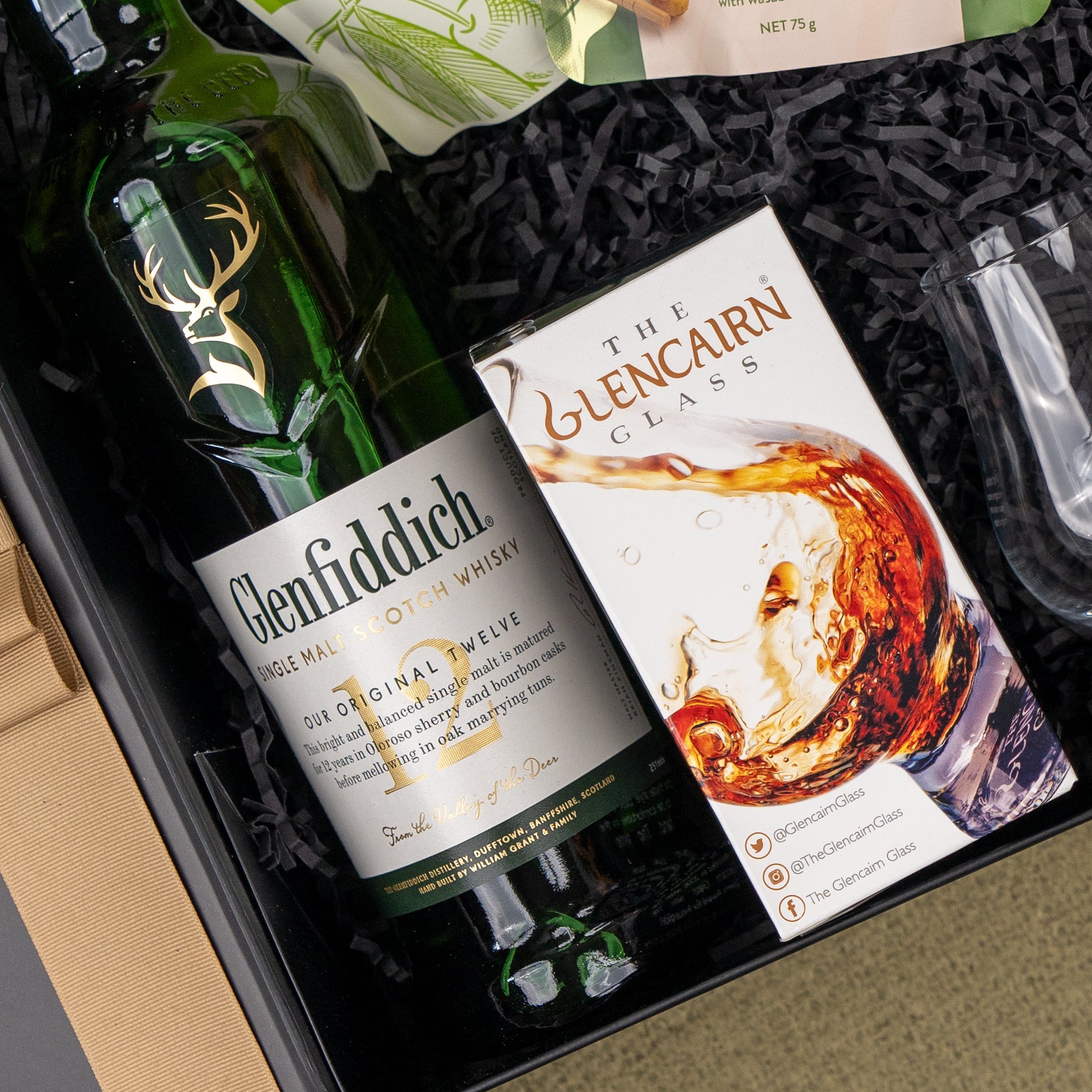 Glenfiddich 12 Year Old Whisky 700ml bottle with rich, fruity notes and a smooth, mellow finish, perfect for whisky enthusiasts.