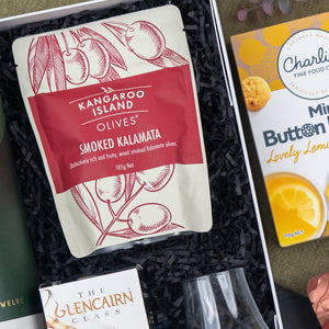 185 grams jar of Kangaroo Island Olives Smoked Kalamata, premium quality olives with a rich, smoky flavour, perfect for enhancing gourmet dishes or enjoying as a snack.