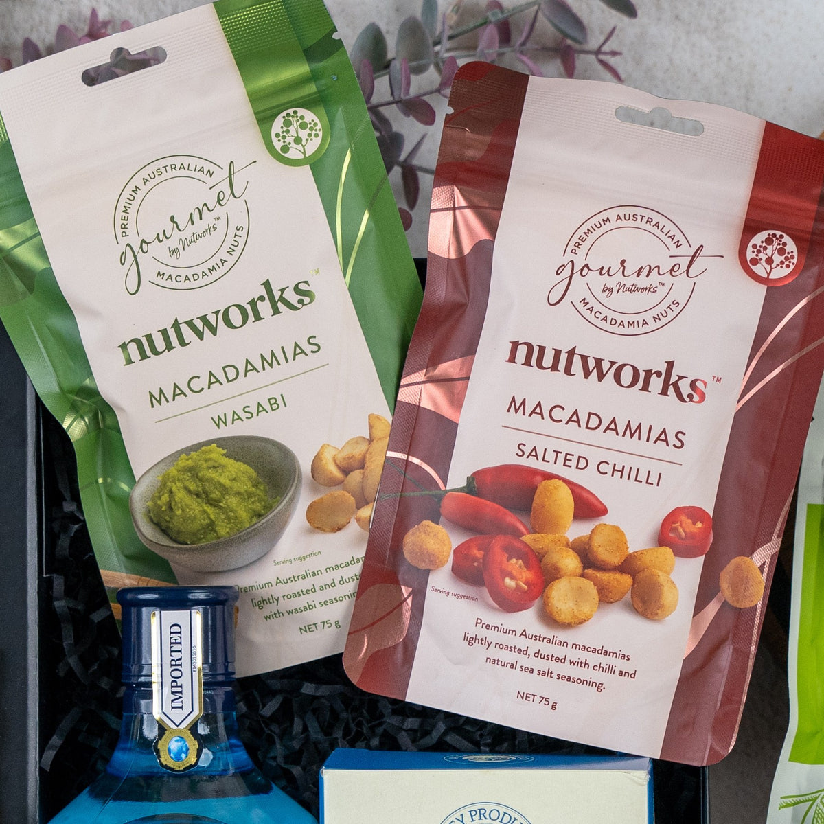 Nutworks Wasabi and Salted Chilli Macadamias above Bombay Sapphire gin, Botanical Escape Hamper
