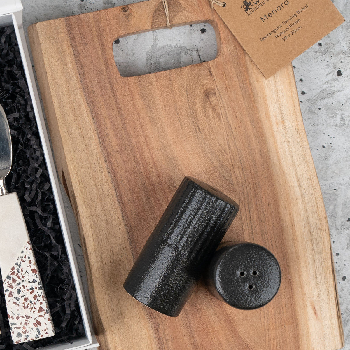Luxe Homeware Hamper: wooden serving board, black salt and pepper shakers and a cheese knife