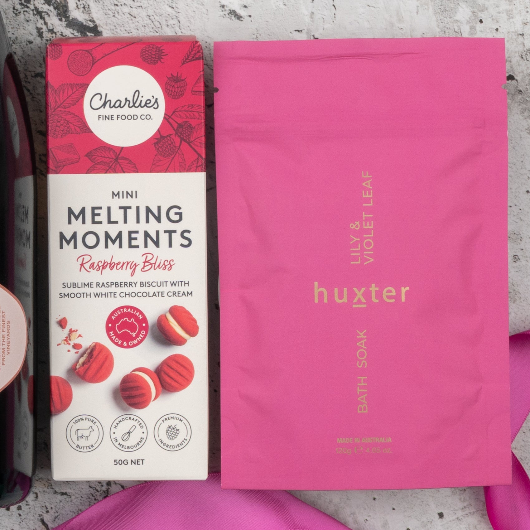 The Chandon Rosé Delights Hamper by The Hamper Boutique Co is displayed on a light textured surface.