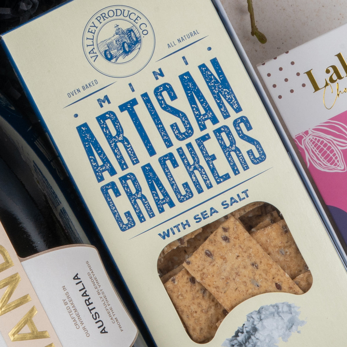 Chandon Celebration Hamper: cream-coloured box with a clear window and blue label