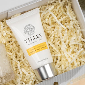 A Veuve Clicquot Premium Celebration Hamper by The Hamper Boutique Co sits on shredded paper packaging inside a gift box.