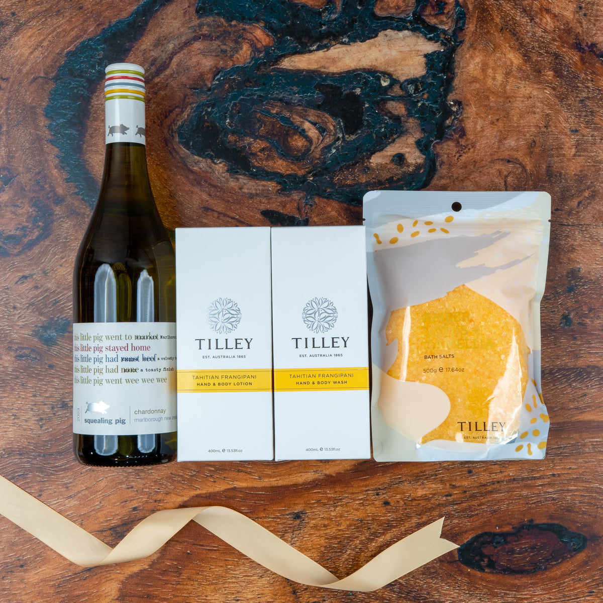 Chardonnay and Self-Care Essentials: Chardonnay, two Tilley products and yellow bath salts