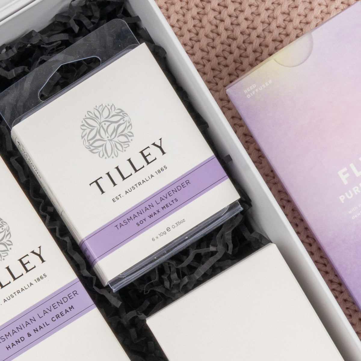 White Wine and Relaxation: Tilley soy wax melts in white and lavender packaging